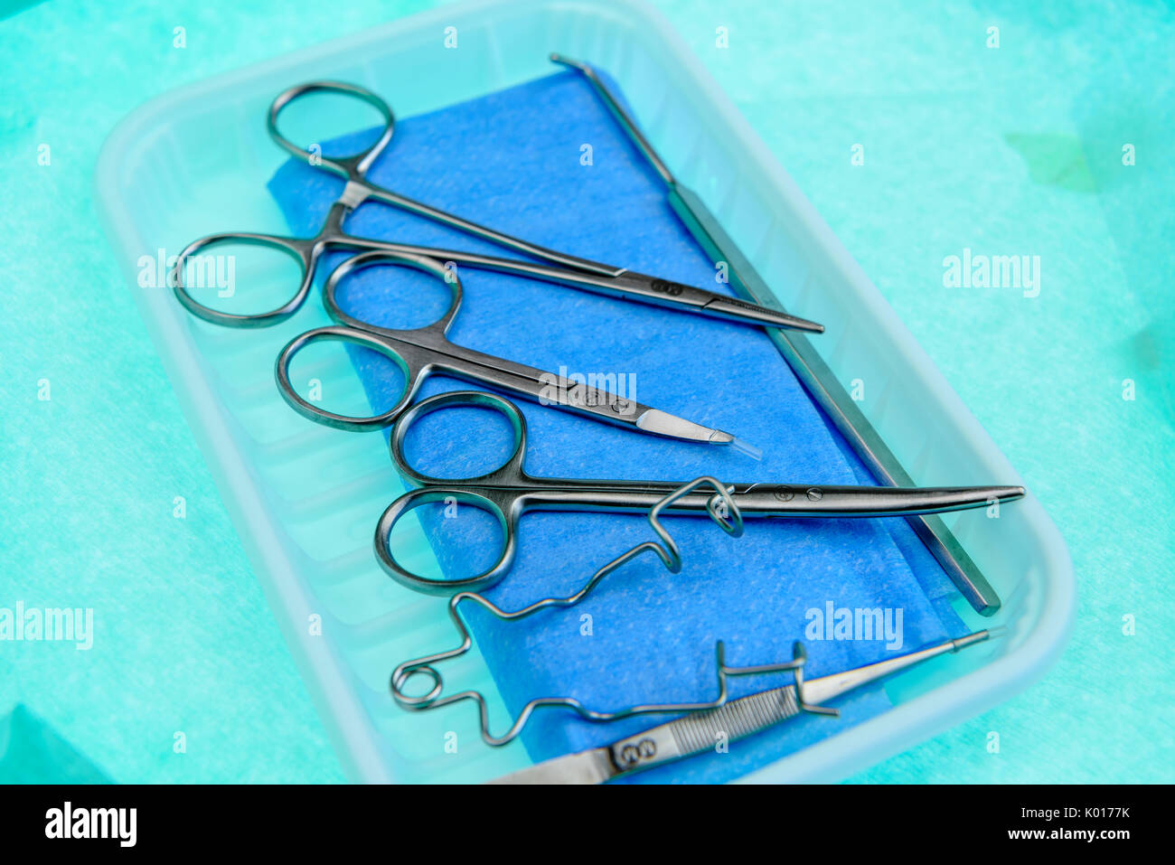 Scleral Buckling Set with stainless steel instruments for eye surgery including a Barraquer Eye speculum, and a Von Graefe Strabismus Hook Stock Photo