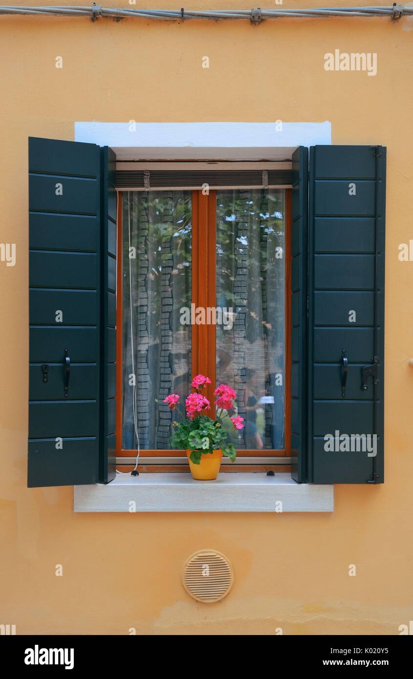 A closeup view of window in historical buildings in Venice, Italy Stock ...