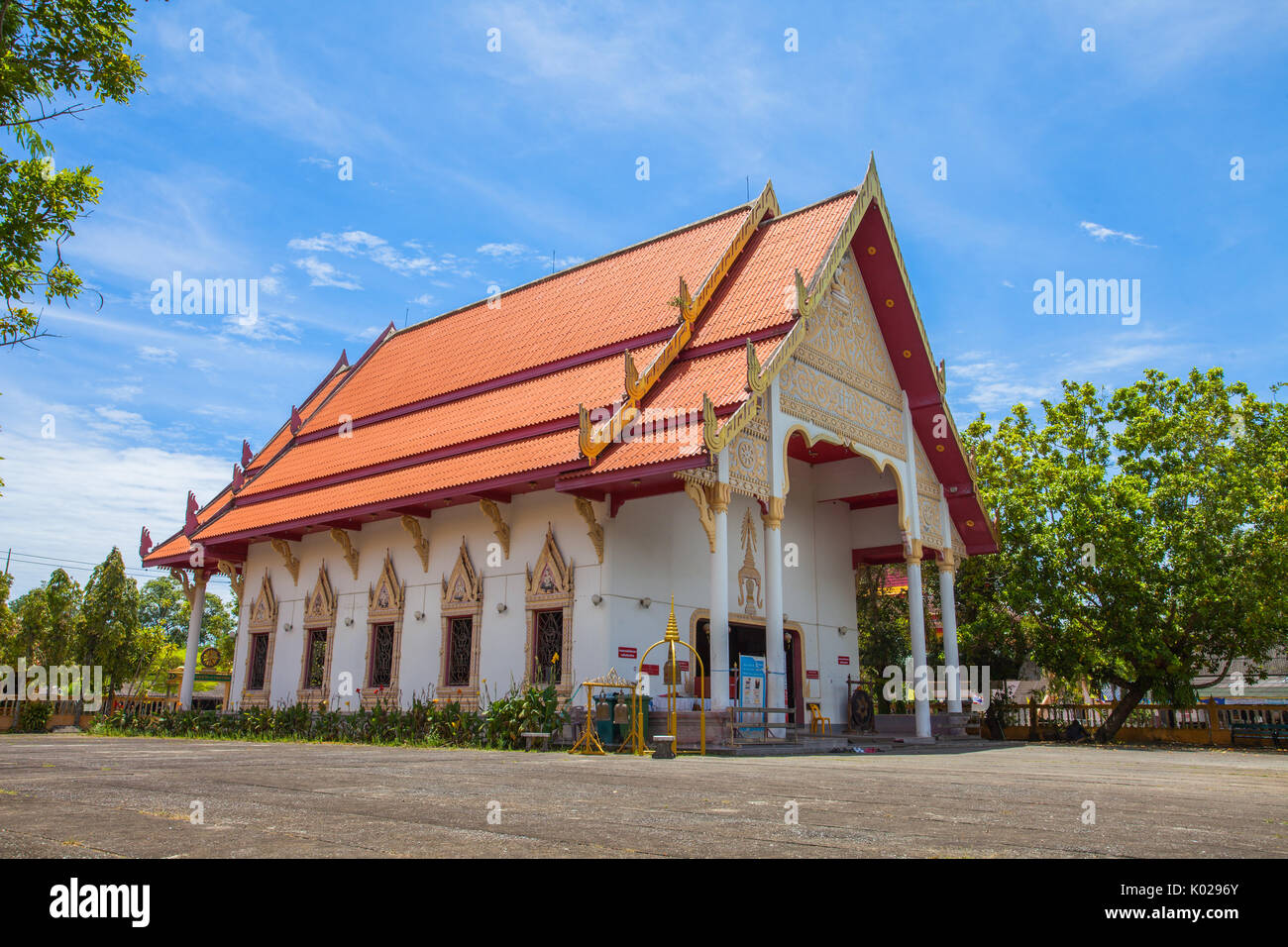Wat Phra Thong is a famous temple in Phuket. Formerly when the war happened The people in Phuket brought the soil to cover the Buddha's gold to flood  Stock Photo