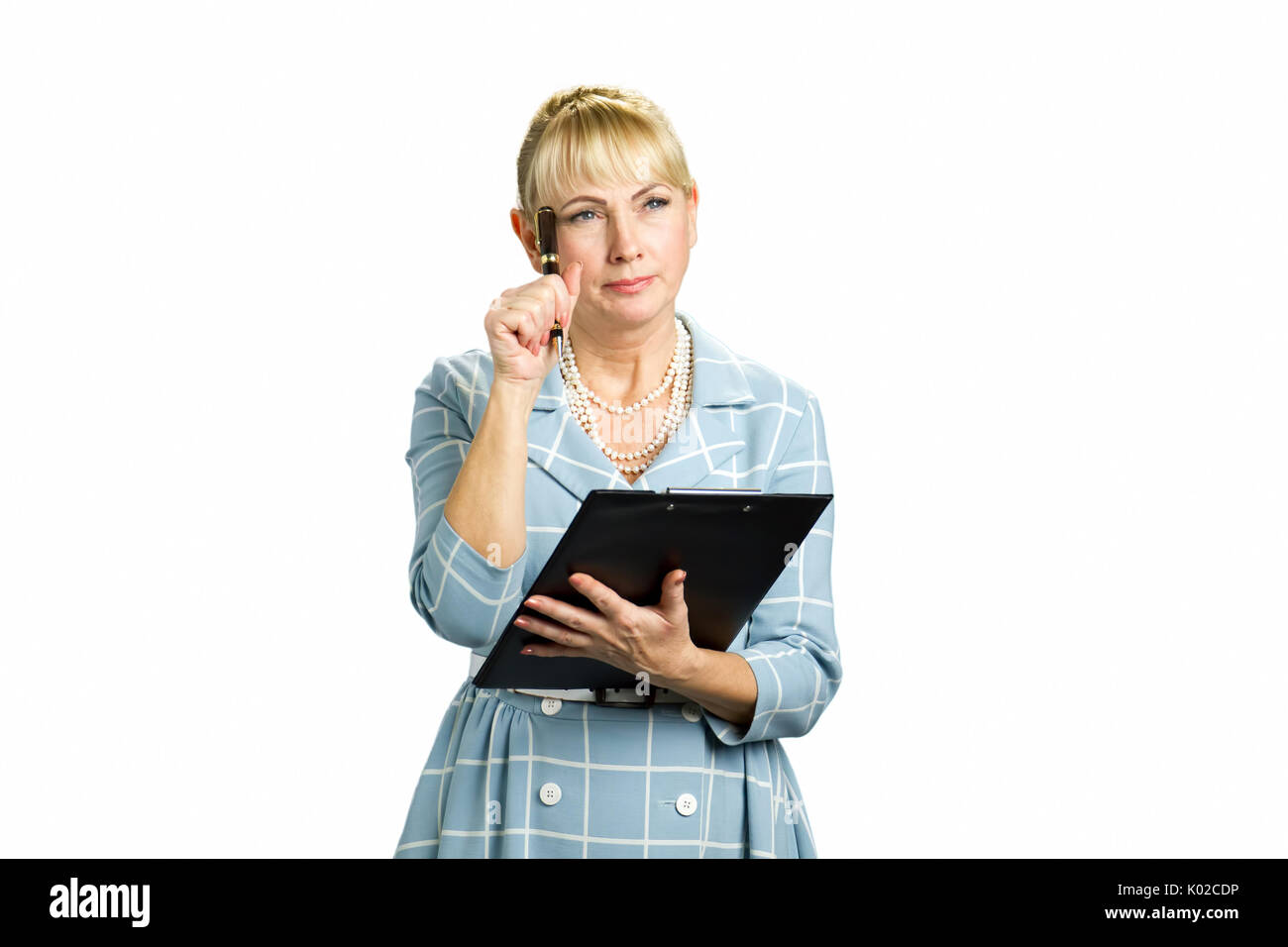 Mature woman paperwork thinking hi-res stock photography and images - Alamy