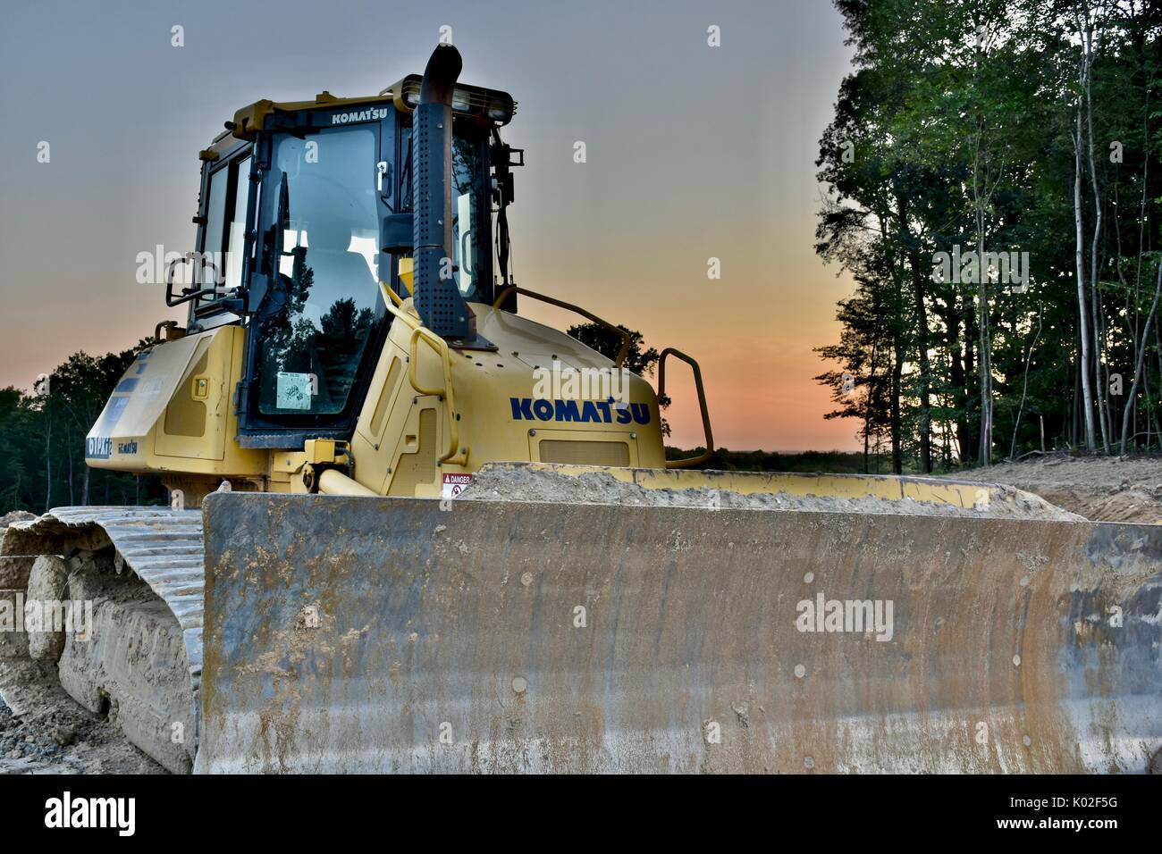 Komatsu bulldozer at sunset Stock Photo