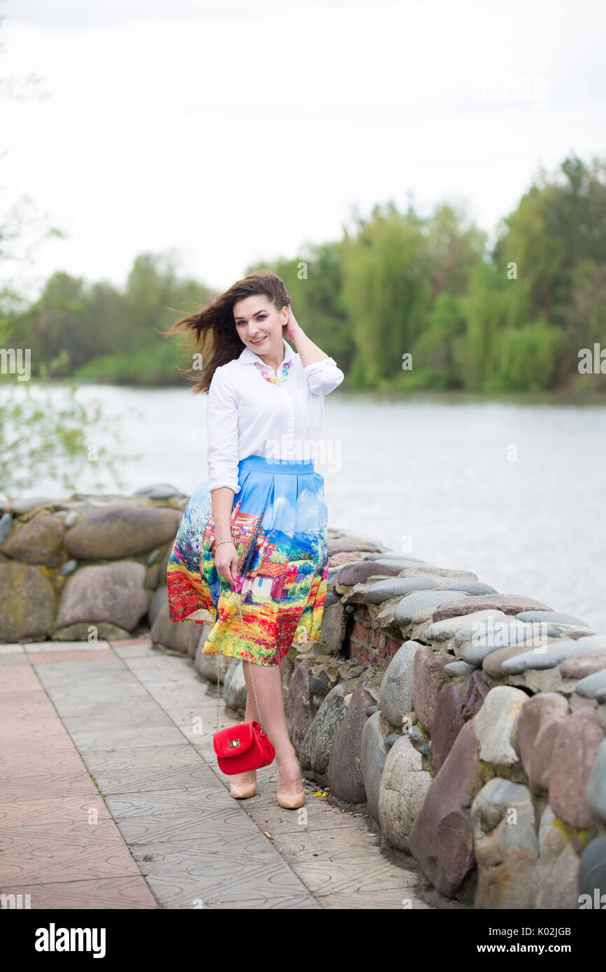 Portrait of a beautiful young girl on nature Stock Photo - Alamy