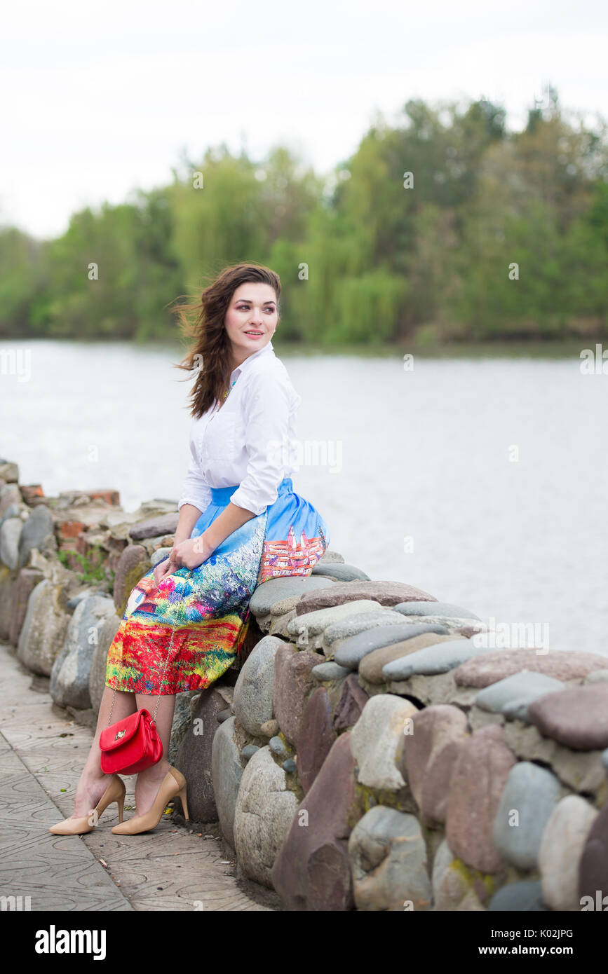 Portrait of a beautiful young girl on nature Stock Photo - Alamy