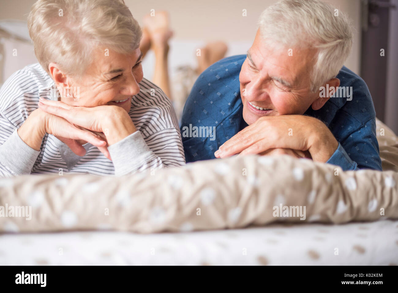 Happy senior marriage staring at each other Stock Photo