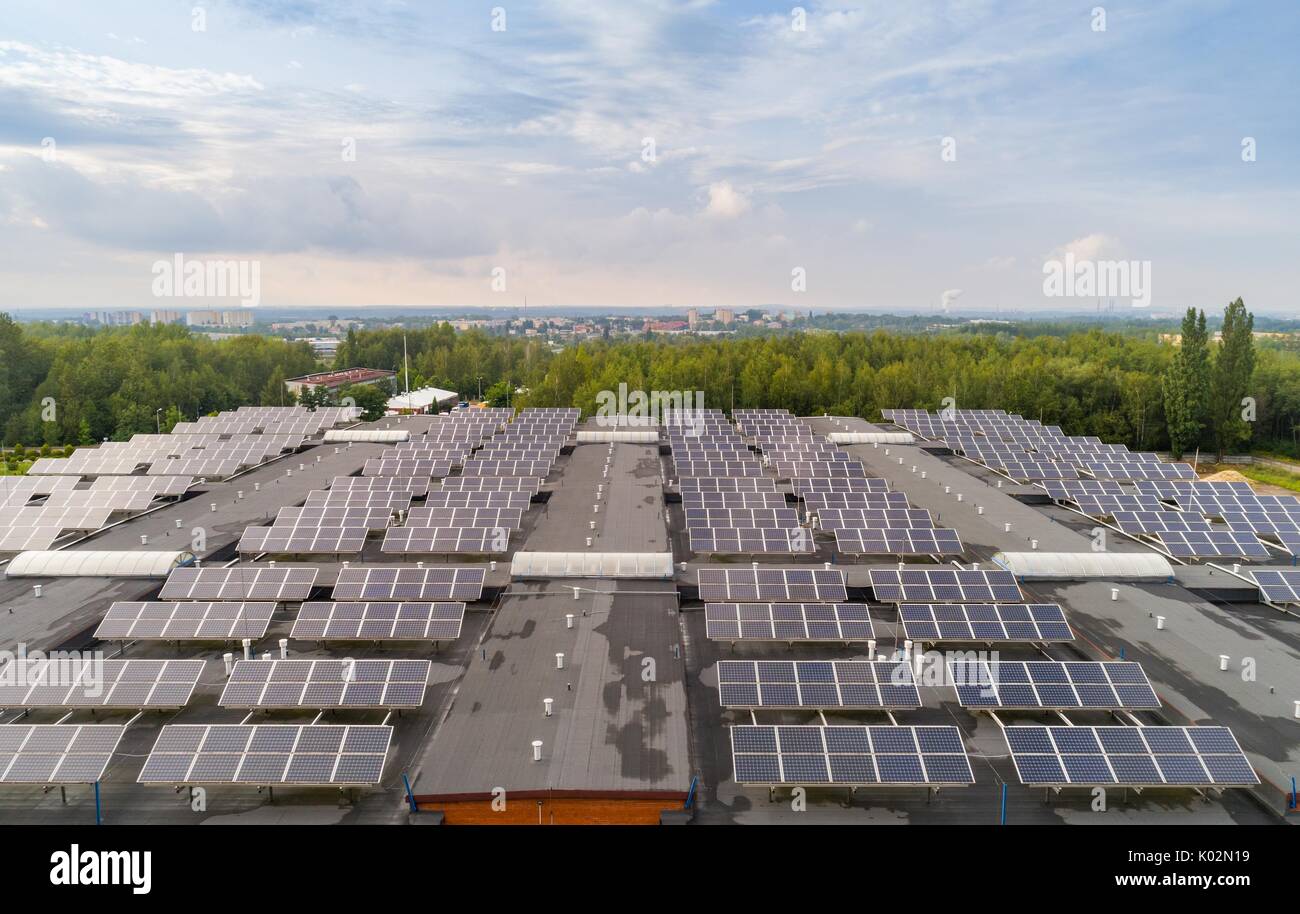 Solar panels mounted on the roof. Green energy Stock Photo - Alamy