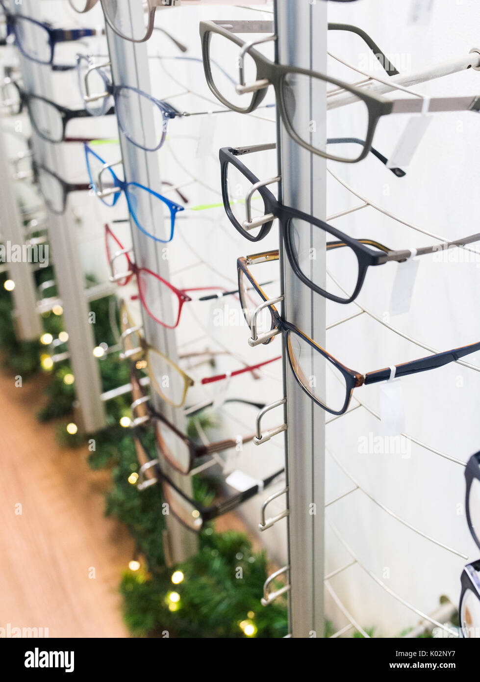 Row of luxury eyeglass at an opticians store Stock Photo Alamy