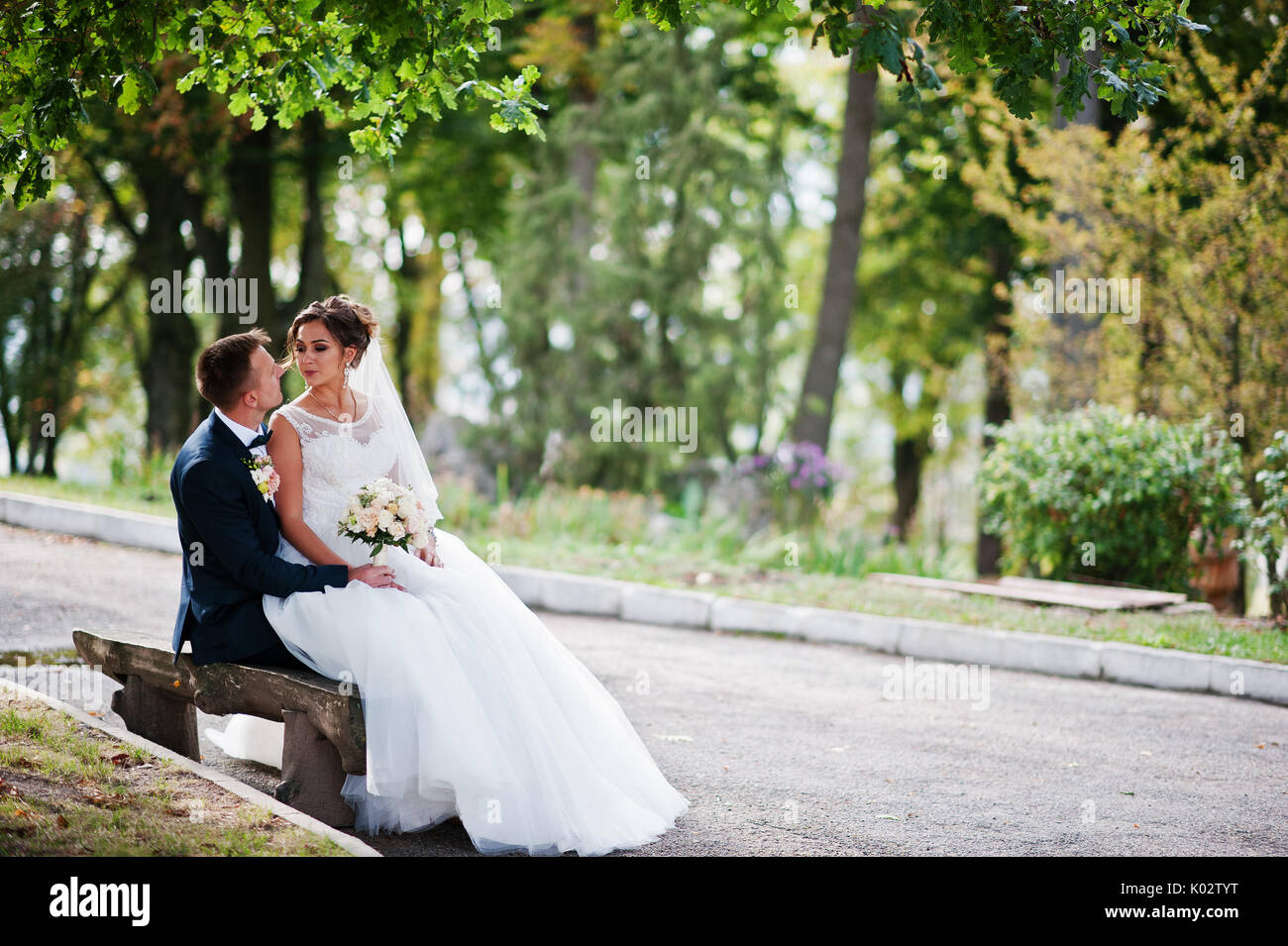 Wife sitting on husbands lap hi-res stock photography and images - Alamy