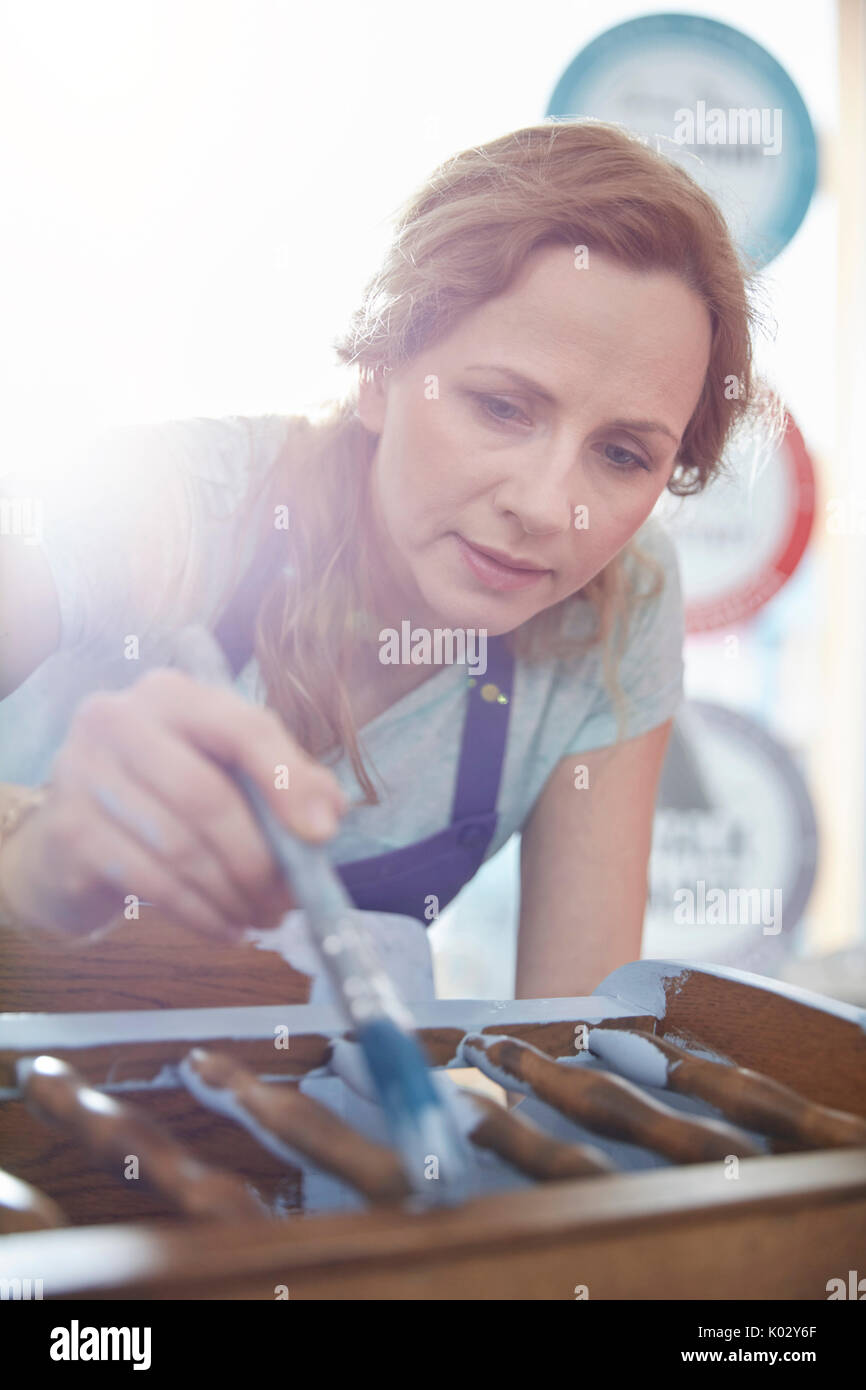 Painter woman holding paint hi-res stock photography and images - Alamy