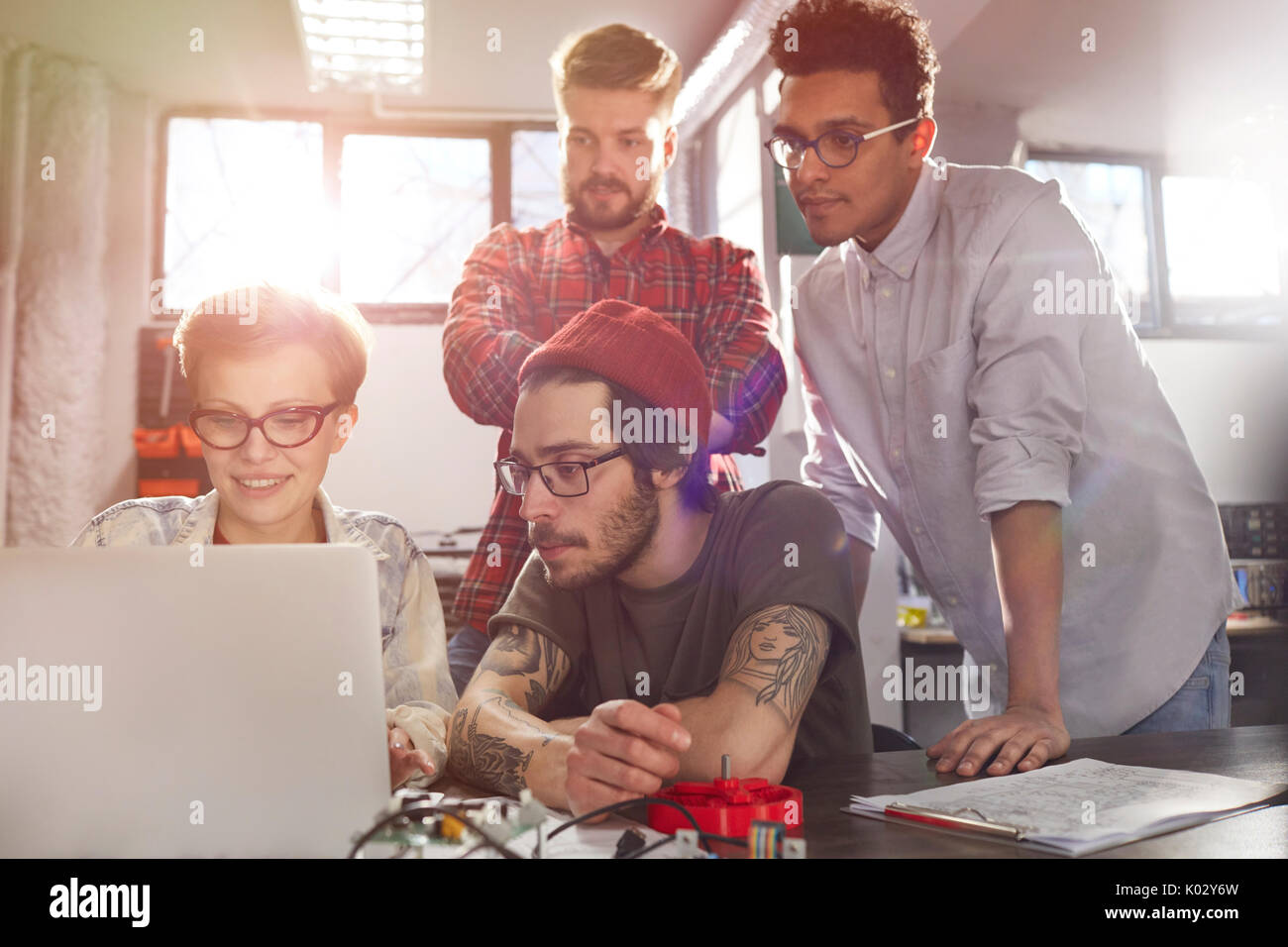 Designers working at laptop Stock Photo