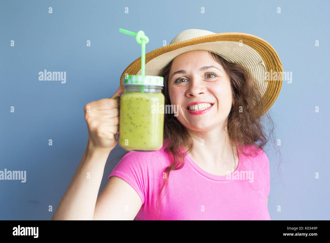 Organic Food. Healthy Eating Woman Drinking Fresh Raw Green Detox