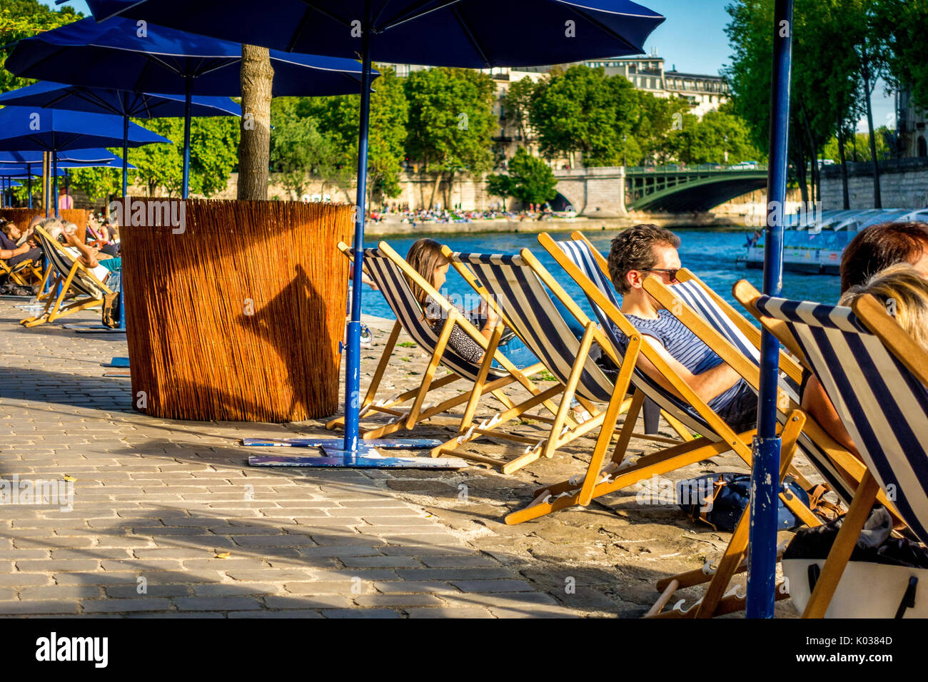 Crowds of people enjoy a summer day during the Paris Plages Stock Photo