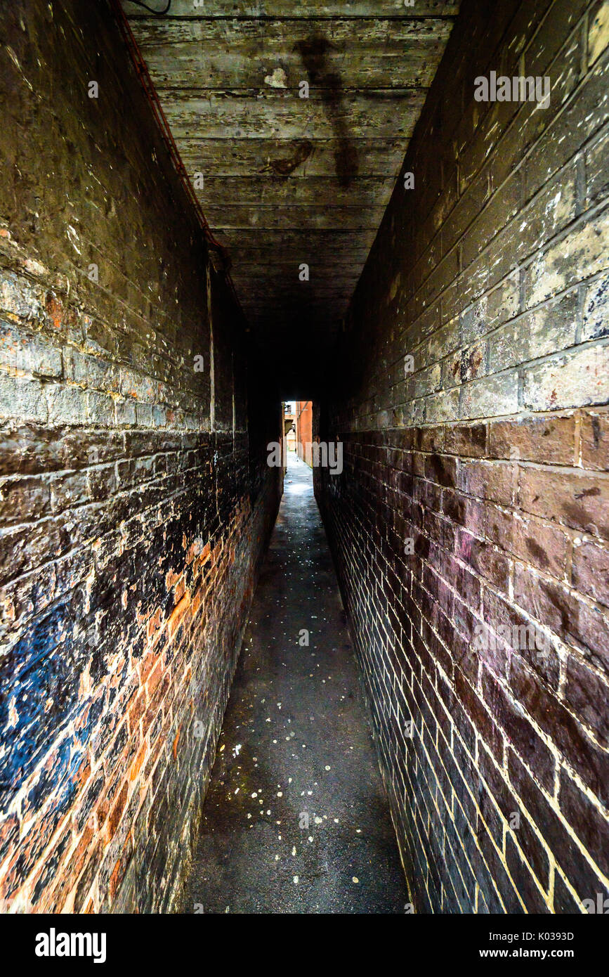 a very narrow brick tunnel in northampton uk Stock Photo Alamy
