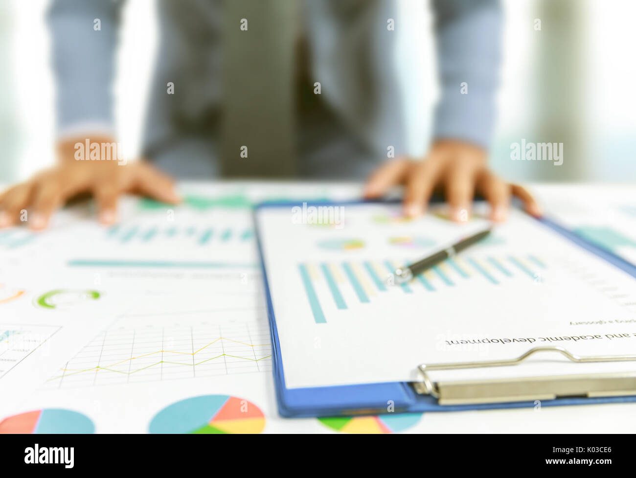businessman write business plan with chart Stock Photo Alamy