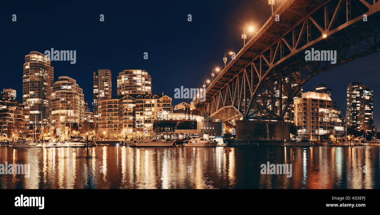 Vancouver False Creek at night with bridge and boat panorama Stock ...