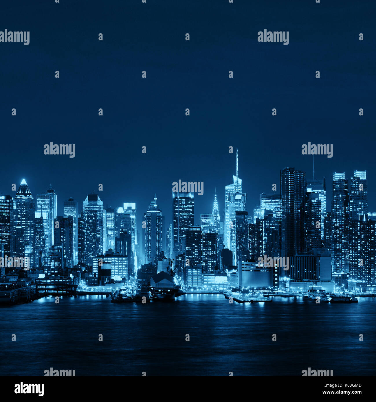 Midtown skyline over Hudson River in New York City with skyscrapers at ...