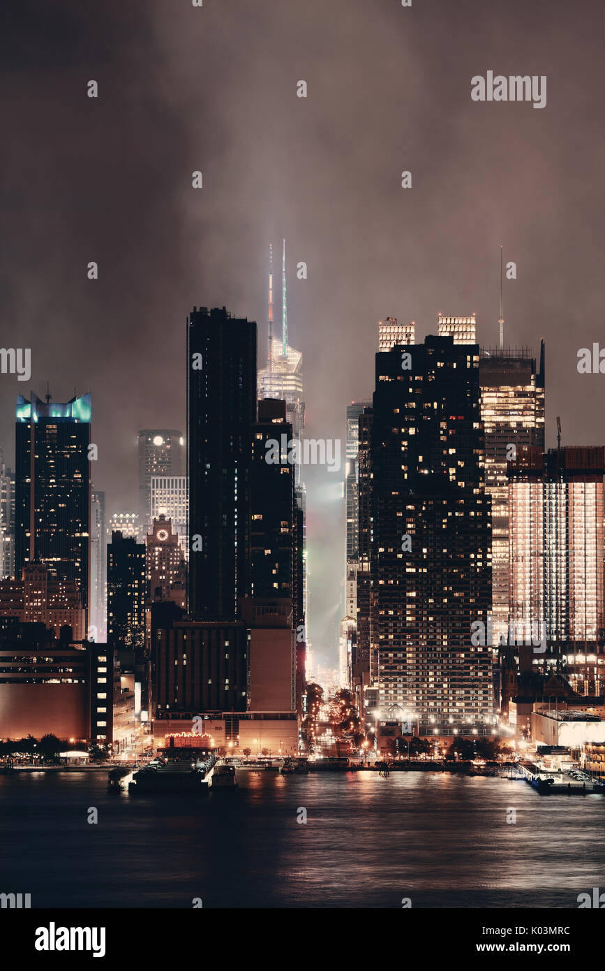 Manhattan midtown skyscrapers and New York City skyline at night with ...