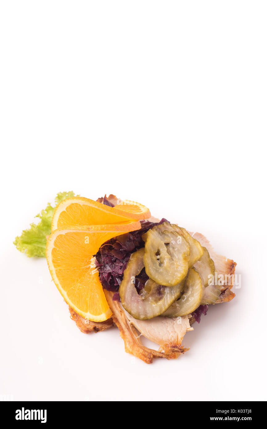 Danish specialties and national dishes, high-quality open sandwich. Roasted Pork belly and Pickled red cabbage and orange isolated on white background Stock Photo