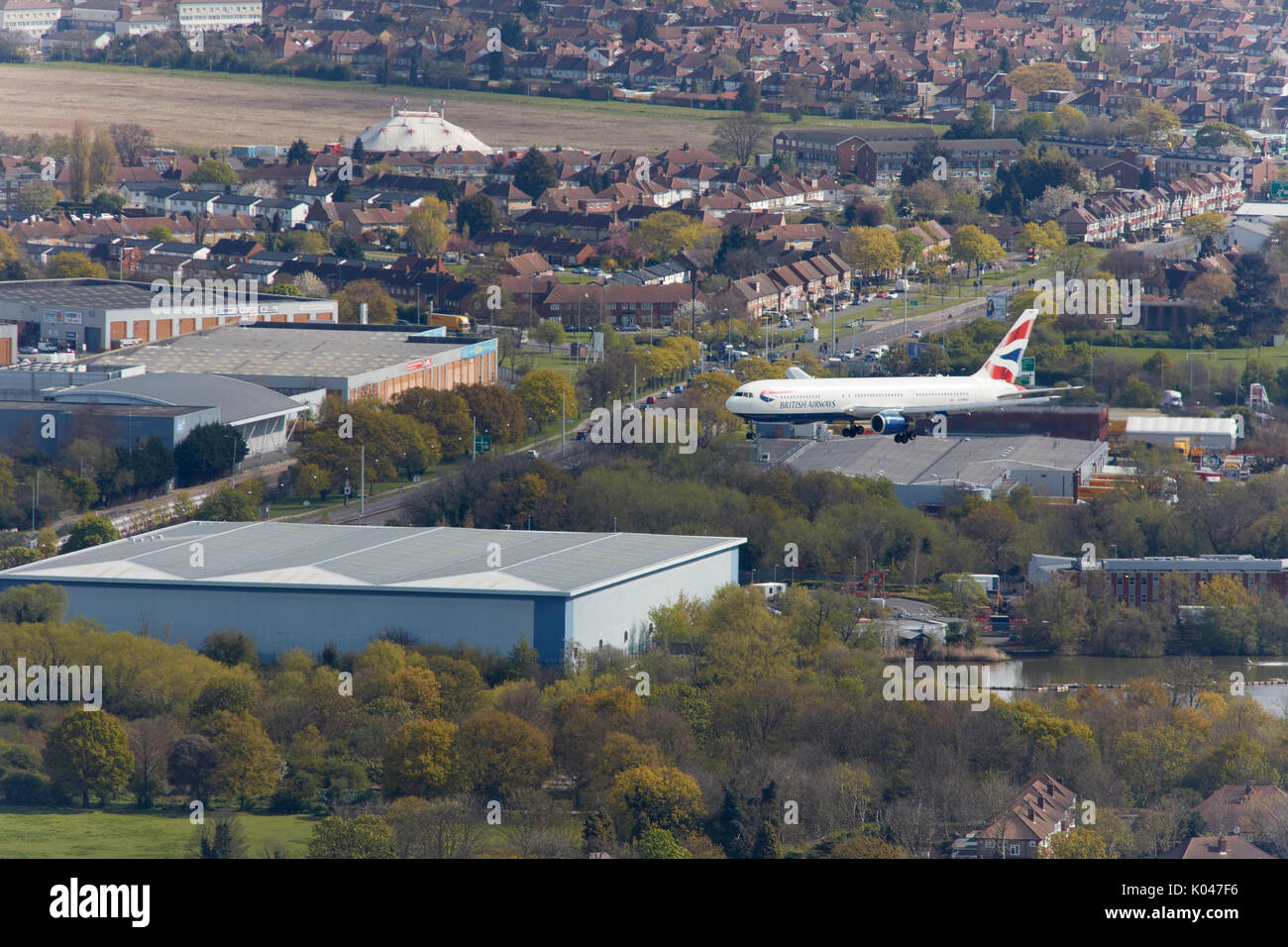 An aerial view of a British Airways passenger aircraft on short finals at London Heathrow Airport Stock Photo