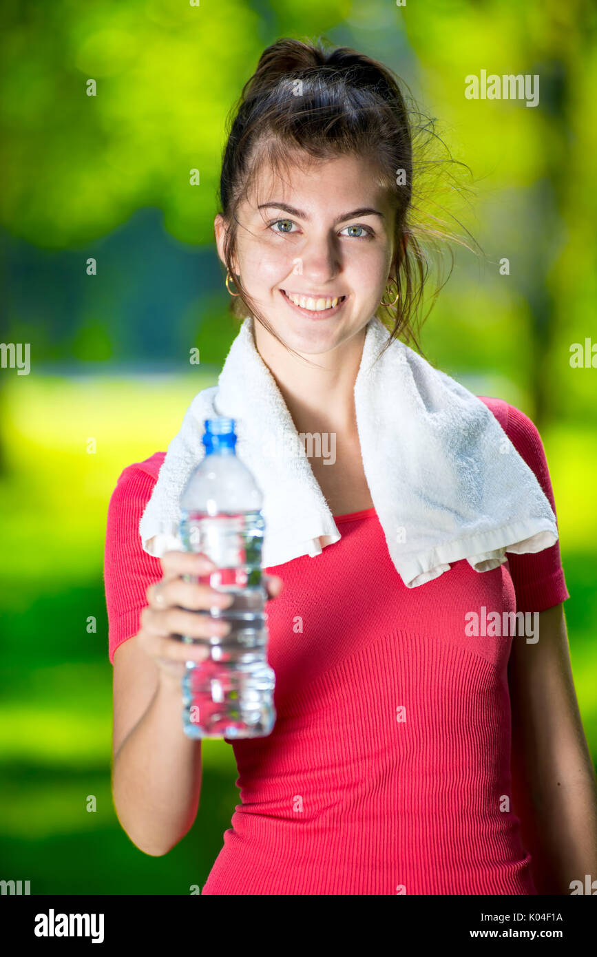 Young woman drinking water Stock Photo Alamy