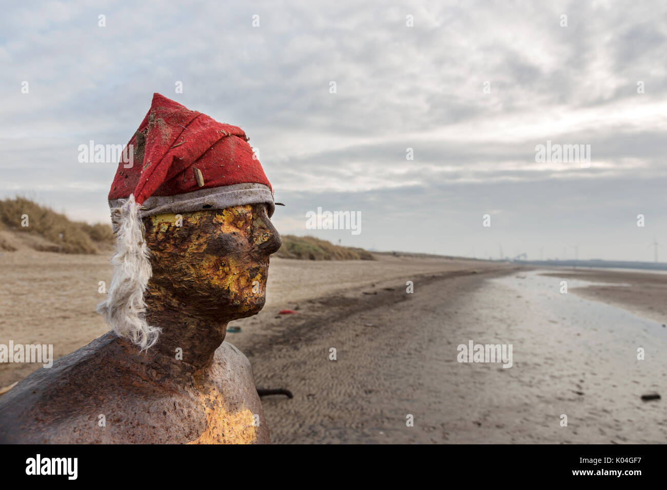 Crosby Statue with Santa hat overlooking Beach Sculpture by Sir