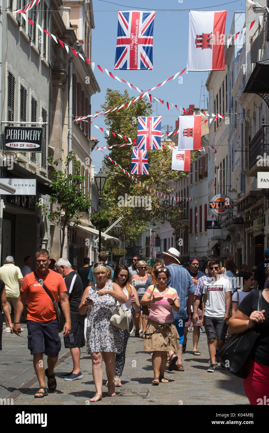 People strolling along Main Street in the UK dependency of Gibraltar