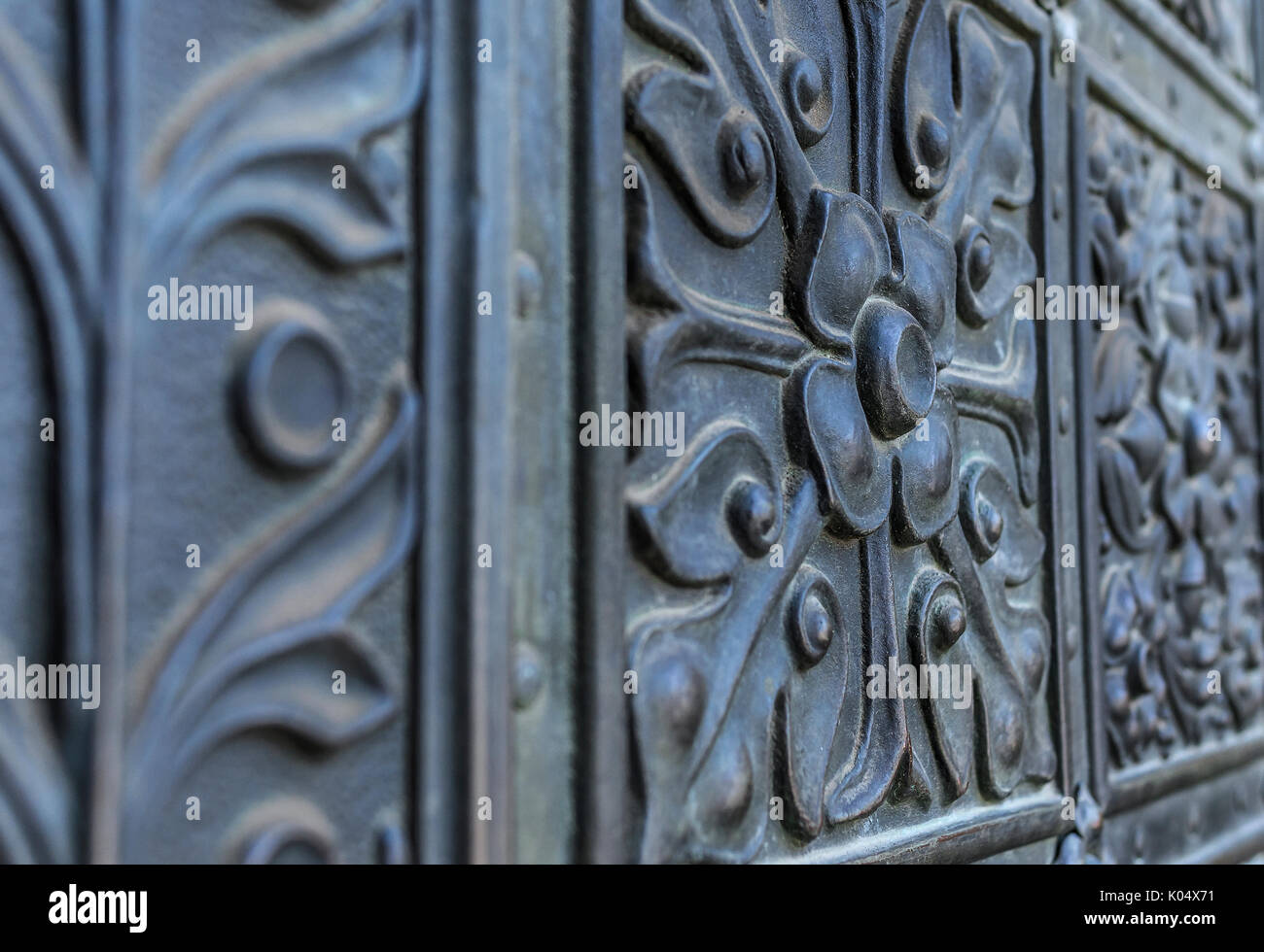 Elements of antique forging on the door. Stock Photo