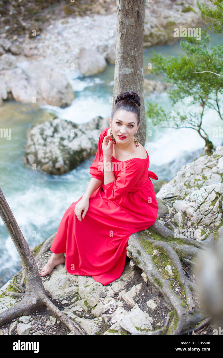 Portrait of a beautiful young girl on nature Stock Photo - Alamy