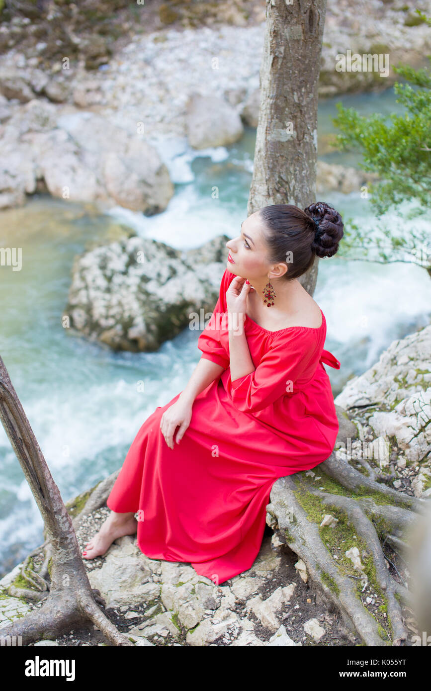 Portrait of a beautiful young girl on nature Stock Photo - Alamy