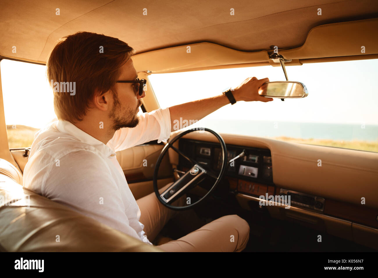 Adjusting the rear view mirror hi-res stock photography and images - Alamy