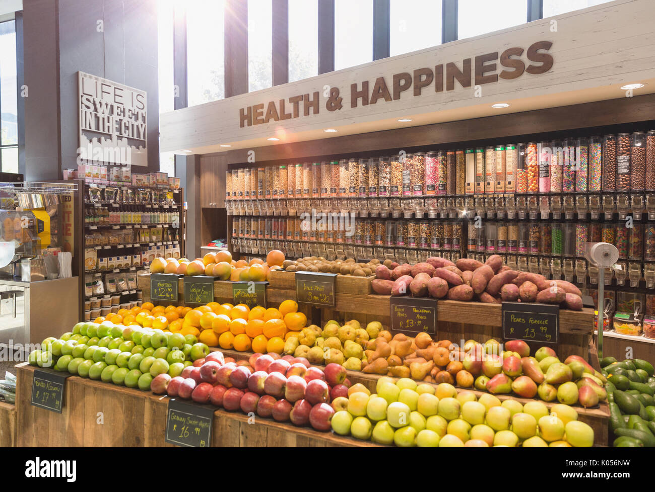 Fresh, organic fruits, vegetables and bulk food in health food store Stock Photo