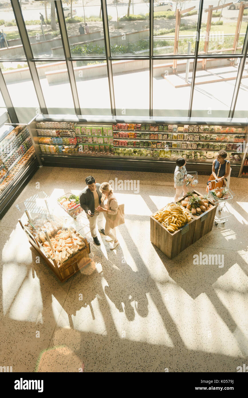 High angle view people grocery shopping in market Stock Photo