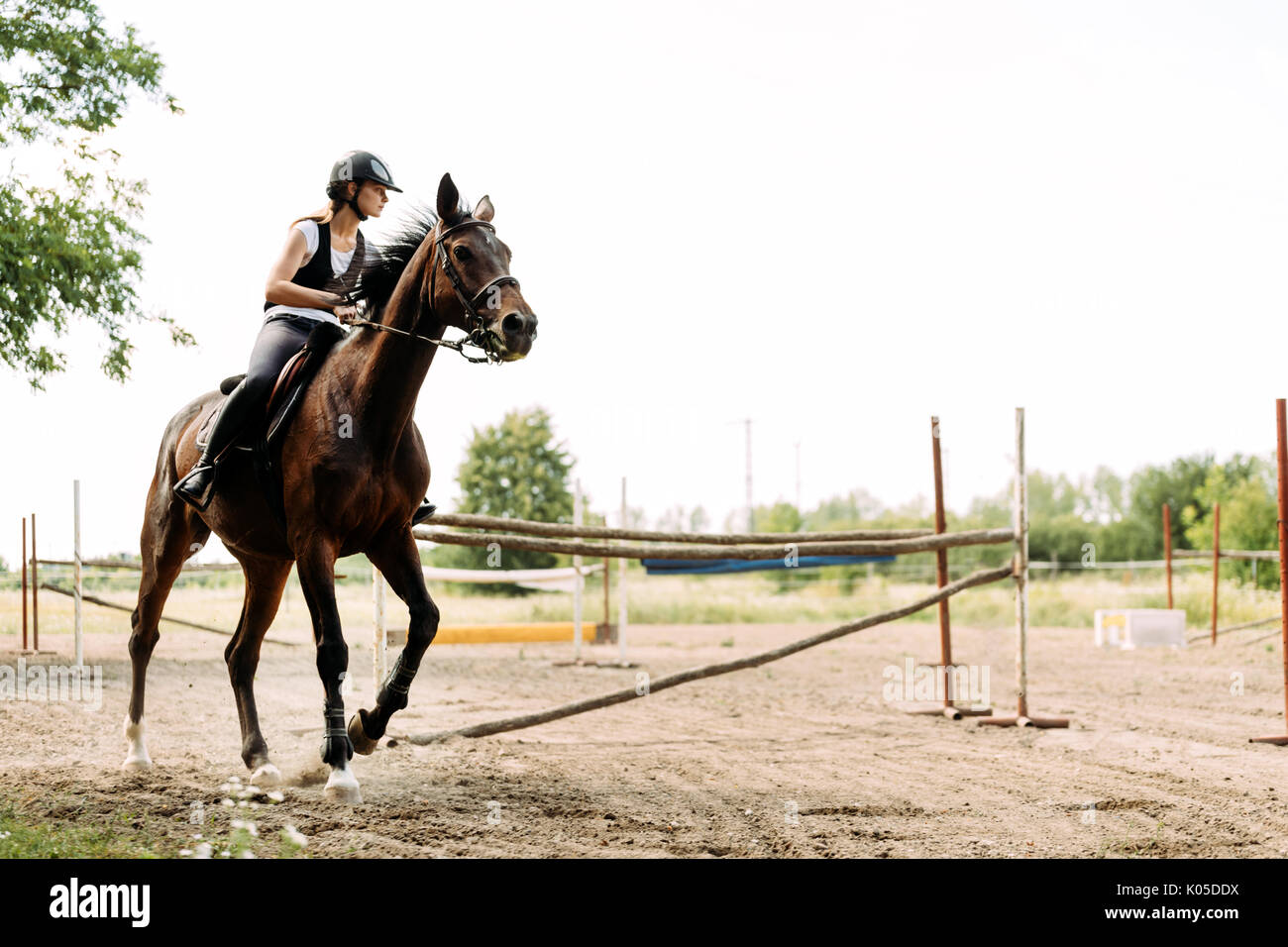 Picture of young pretty girl riding horse Stock Photo
