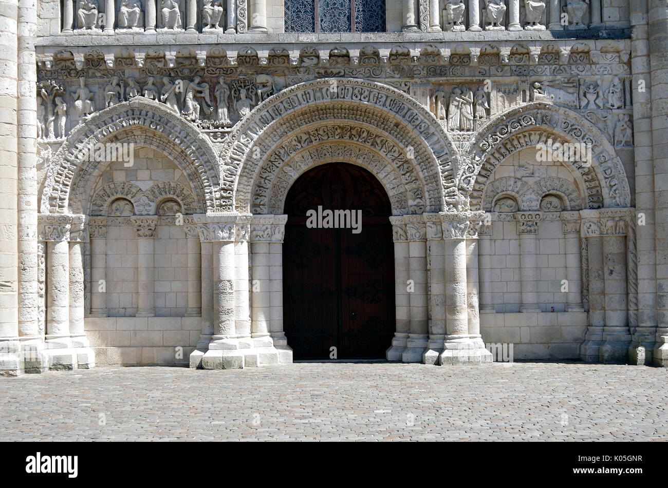 Lower part of West front of Church of Notre Dame le Grande, Poitiers, France, built second half of 11th Century, in High Romanesque style, Stock Photo