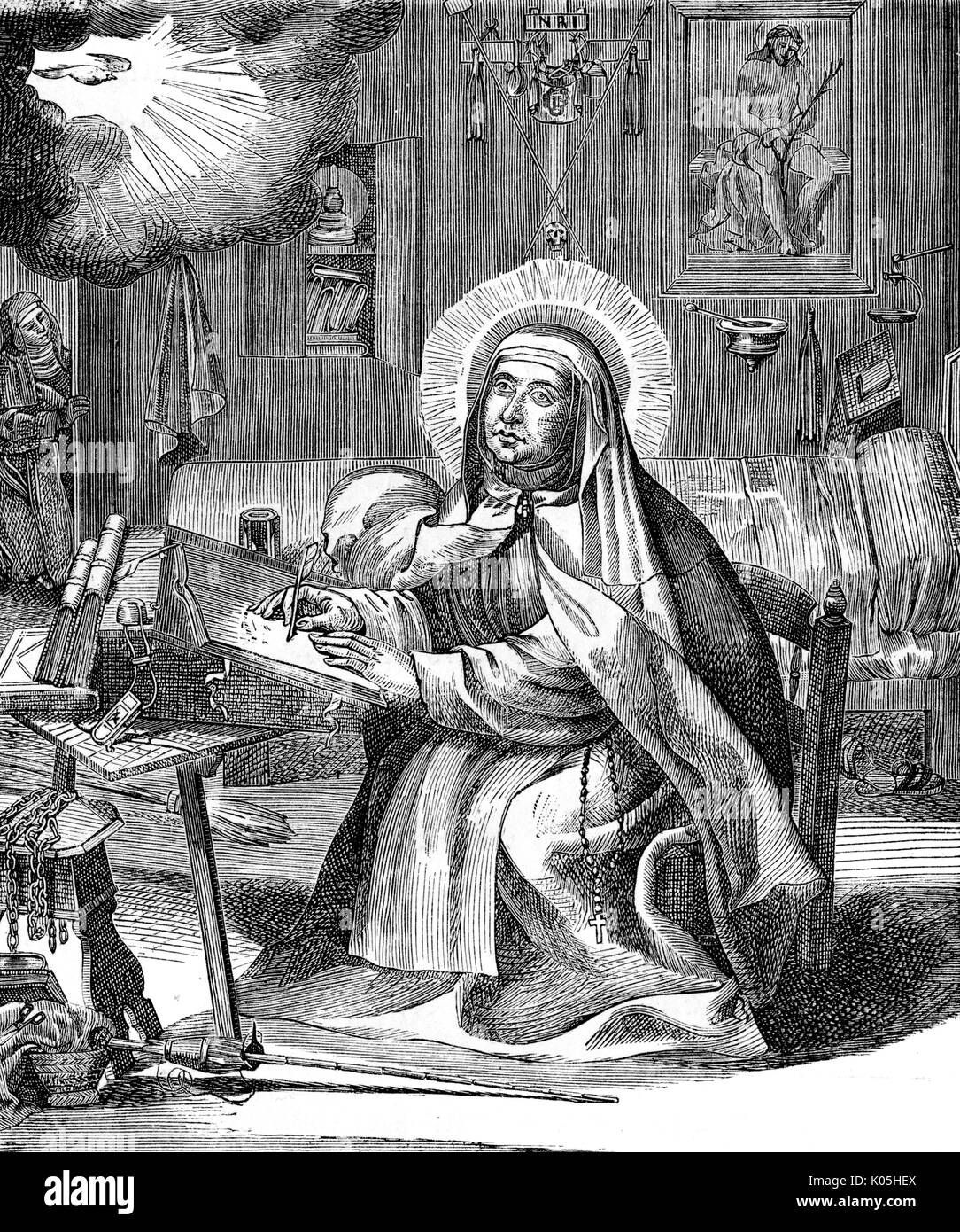 St Teresa of Avila writing Stock Photo Alamy
