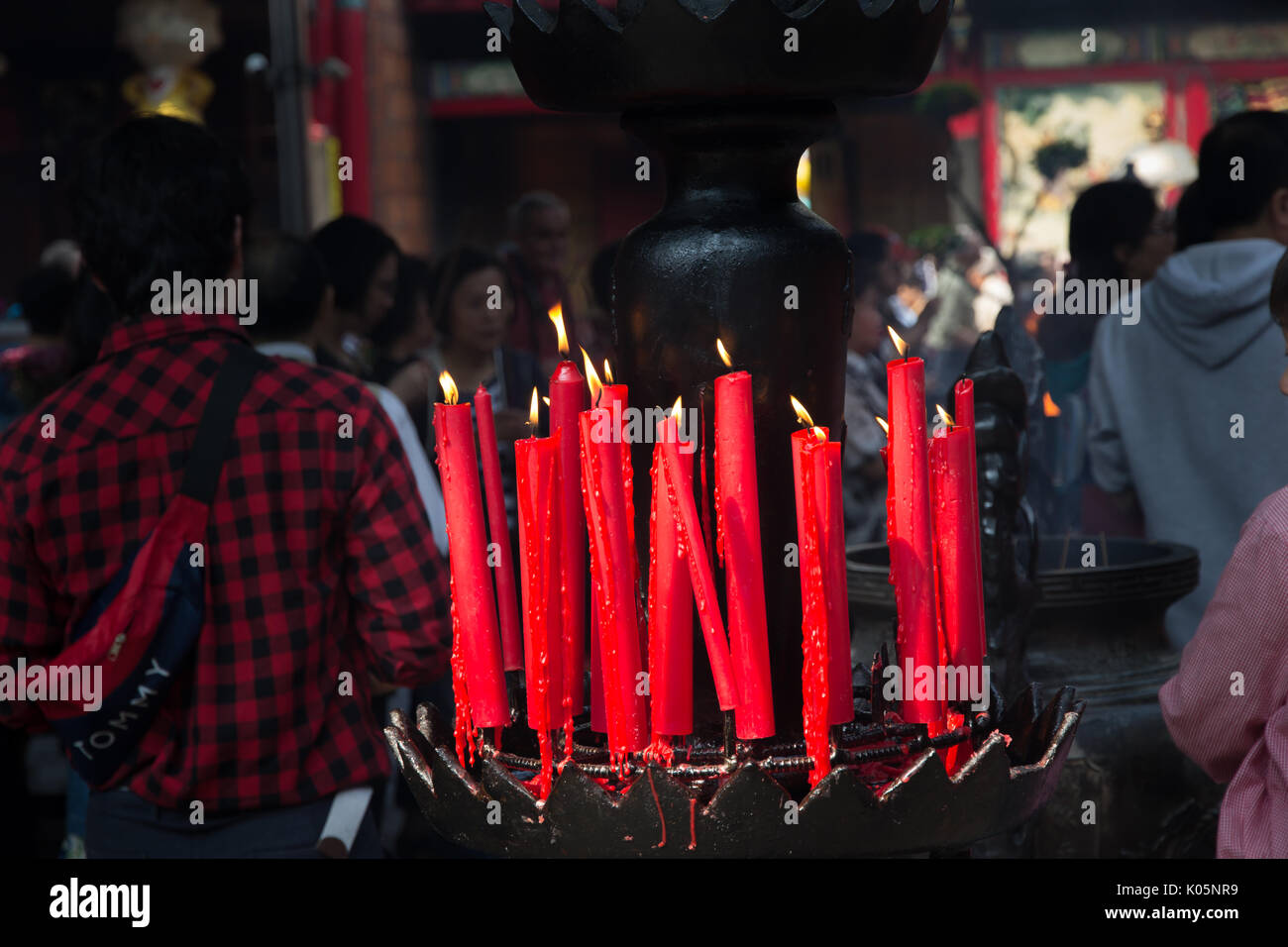 Taipei, Taiwan - March 20, 2015: Buddhists praying in Longshan temple Stock Photo