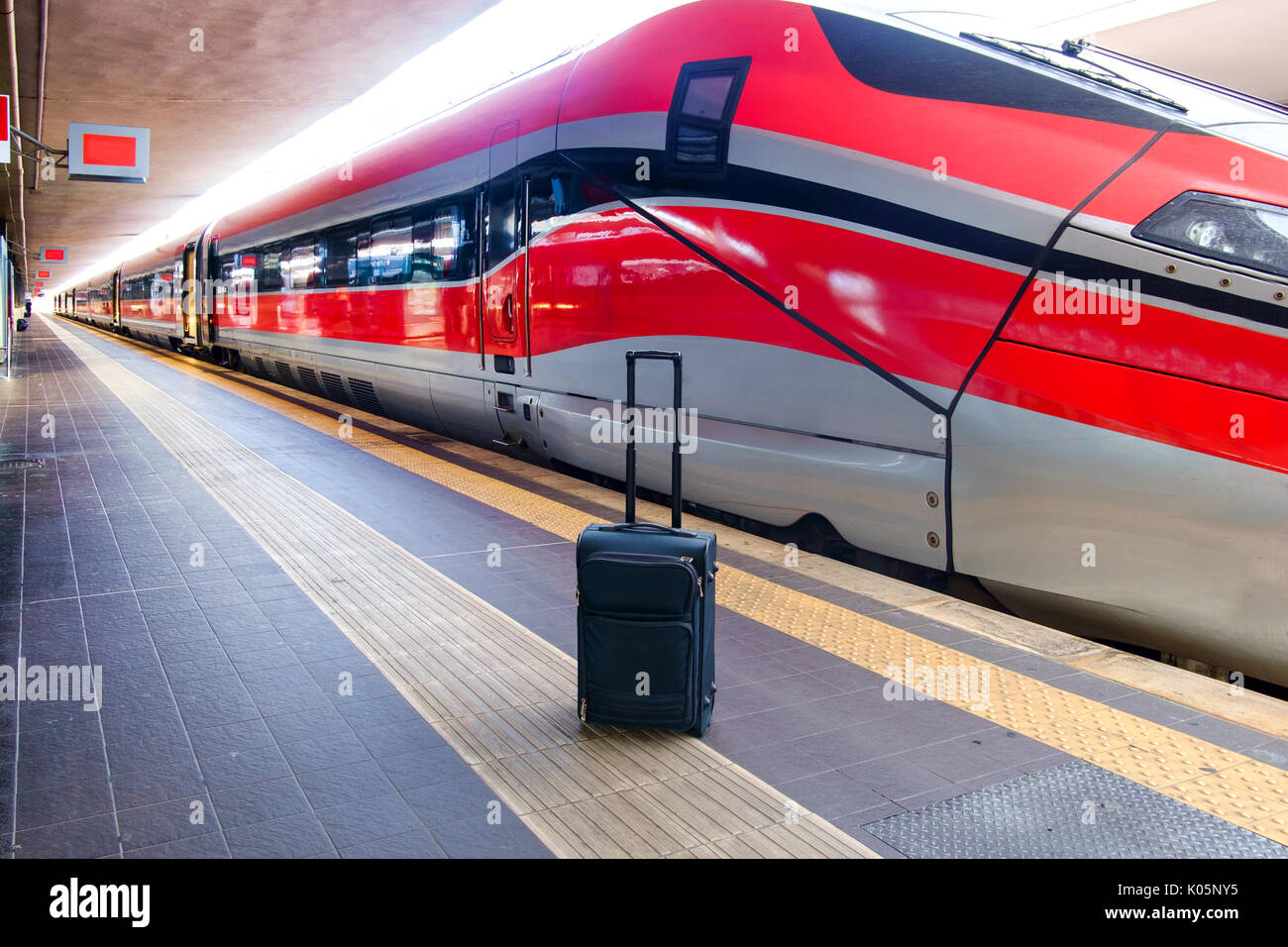 Luggage on a train station platform Stock Photo Alamy