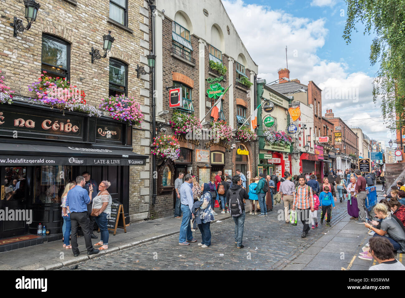 DUBLIN, IRELAND - AUGUST 12: Busy street in the touristic Temple Bar area, in Dublin, Ireland Stock Photo