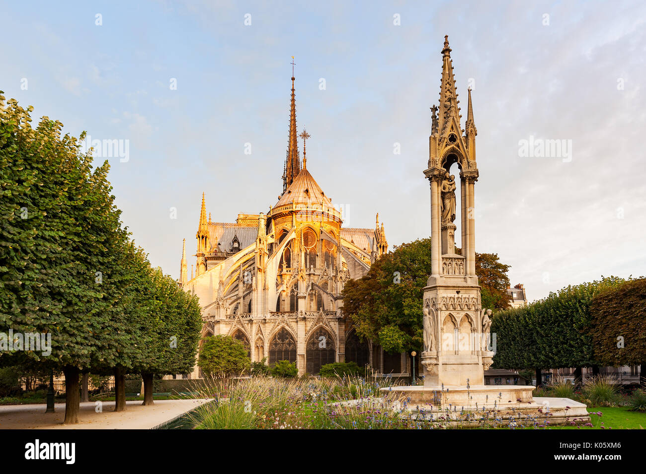 Orange light from sunrise on the top of NotreDame de Paris Stock Photo