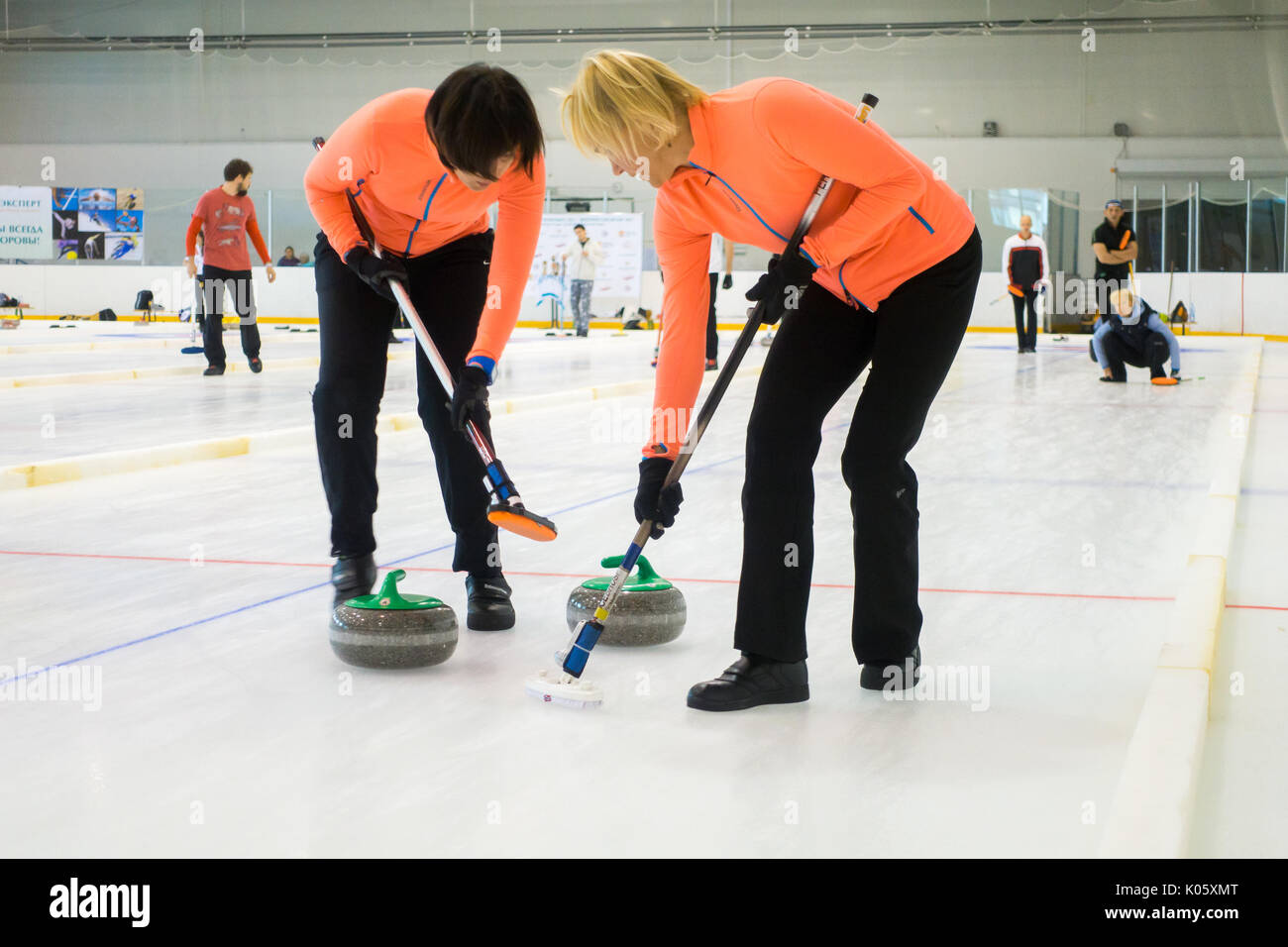 Team members play in curling during IX international Medexpert Curling ...