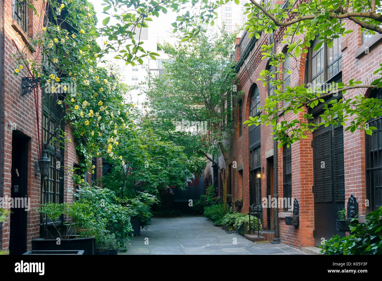 Sniffen Court historic carriage houses (1863-1864) in Murray Hill, New York City. Restored & converted into residences, theater & amateur comedy club. Stock Photo