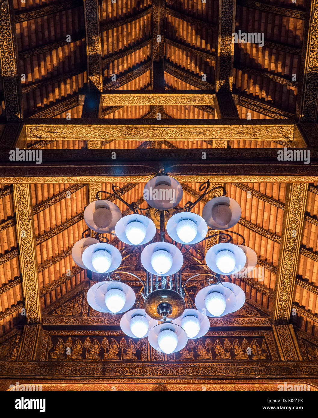 Large luxury chandelier is hanging on the wooden beam of the Thai  church.(Public area not required Property Release Stock Photo - Alamy