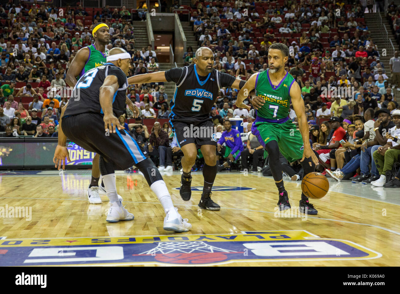 Cuttino Mobley #5 Power blocks Mahmoud Abdul-Rauf #7 3 Headed Monsters week nine BIG3 three-on-three basketball league KeyArena August 20,2017 Seattle,Washington. Stock Photo