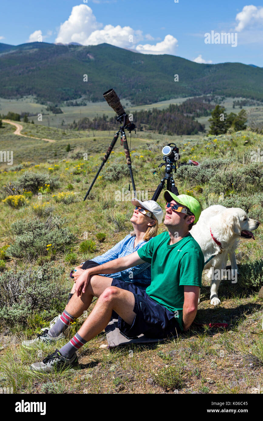 San Luis Valley, Central Colorado, USA. 21st Aug, 2017. People viewing the midday solar eclipse; the moon between earth & the sun, San Luis Valley, Central Colorado, USA Credit: H. Mark Weidman Photography/Alamy Live News Stock Photo