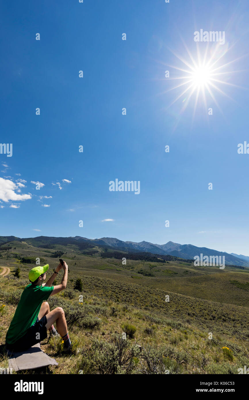 San Luis Valley, Central Colorado, USA. 21st Aug, 2017. People viewing the midday solar eclipse; the moon between earth & the sun, San Luis Valley, Central Colorado, USA Credit: H. Mark Weidman Photography/Alamy Live News Stock Photo
