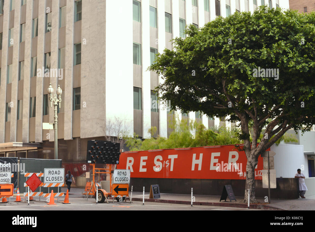 'Resist' Graffiti Standard Hotel's 'Rest Here' sign Standard Hotel DTLA during Solar Eclipse Monday August 21,2017 Los Angeles. Stock Photo