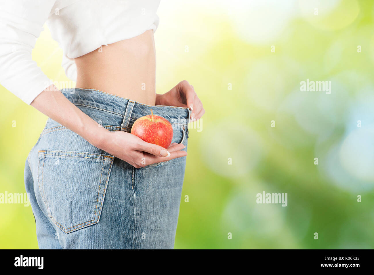 Apple fruits and stomach health concept. Eating healthy apple fruits is