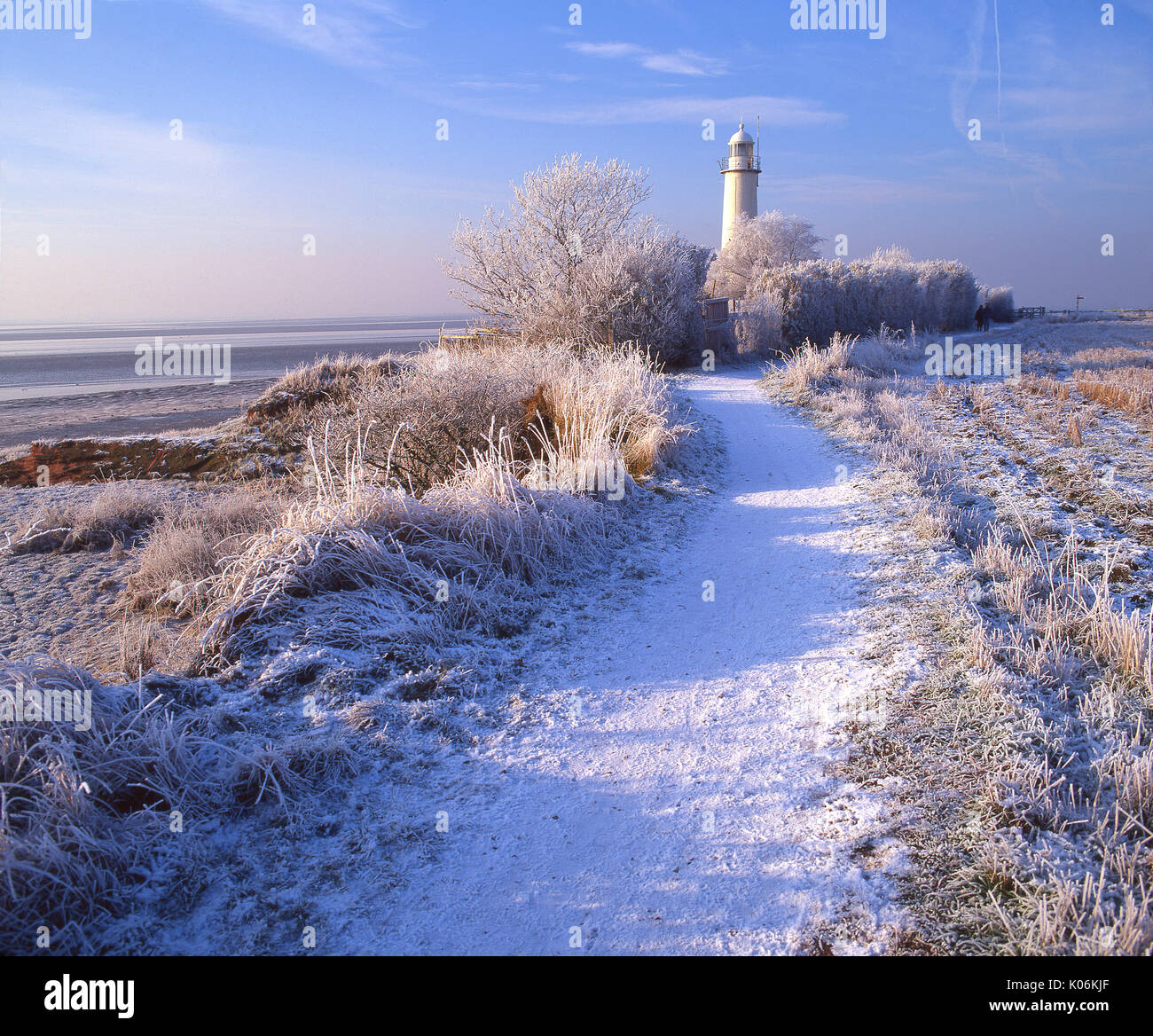 Winter wonderland at Hale lighthouse on the shore of the River Mersey, near Hale Village, Cheshire Stock Photo