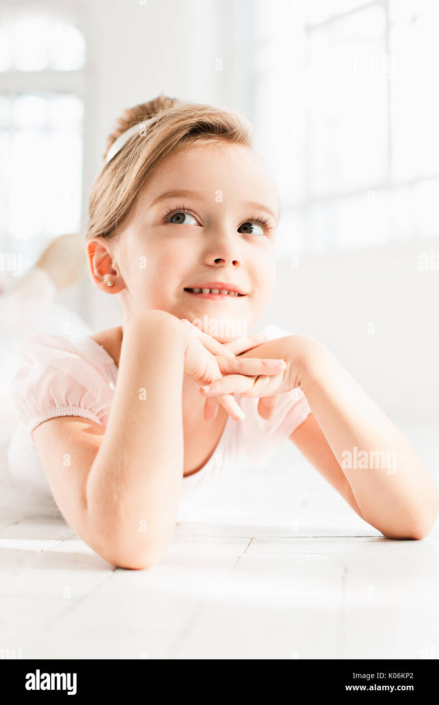 The little balerina in white tutu in class at the ballet school Stock Photo