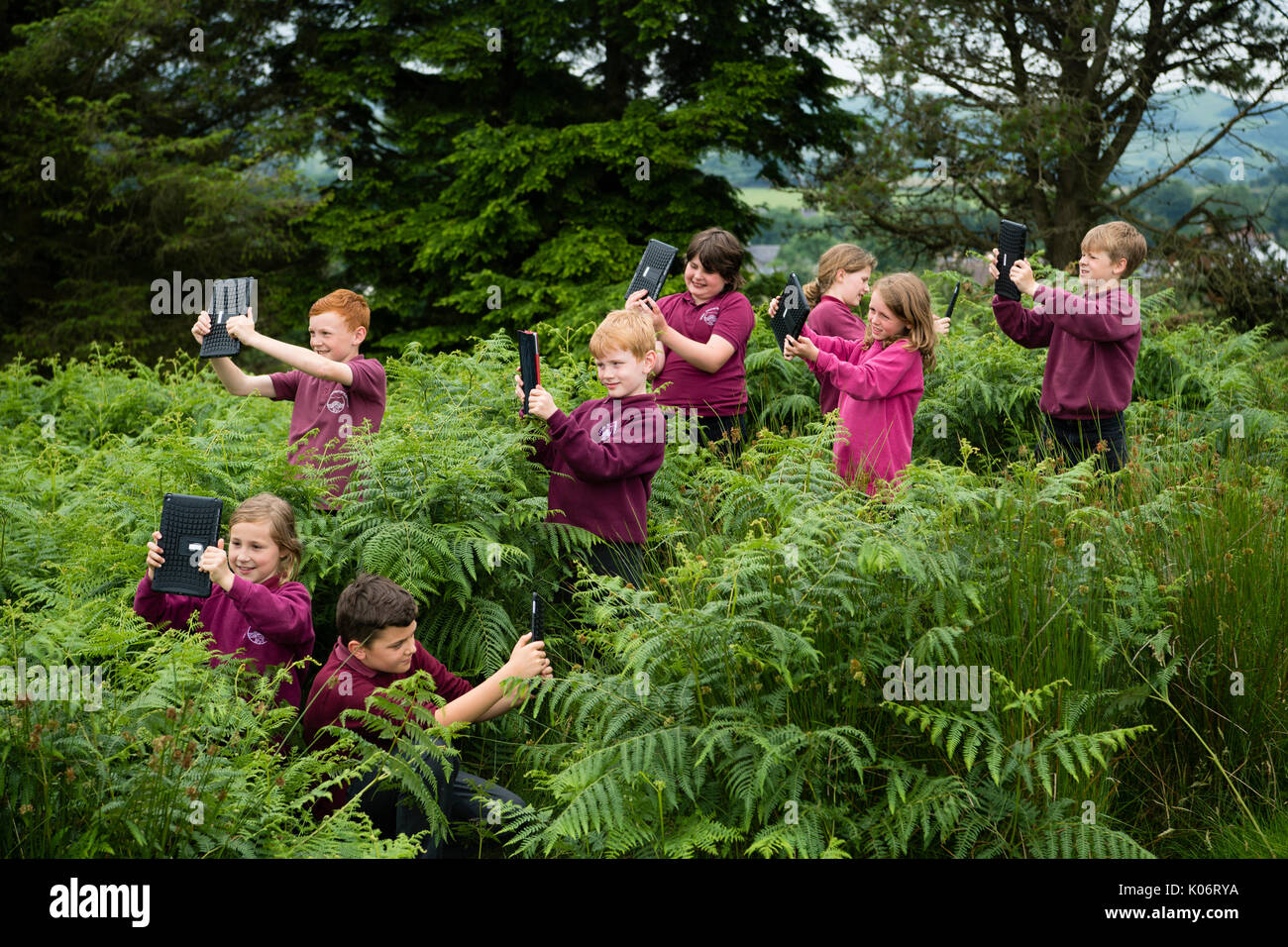 digital-education-a-group-of-primary-school-children-using-their-ipad