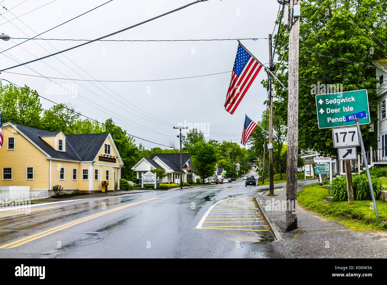 Blue Hill, USA June 9, 2017 American flag on city main street in